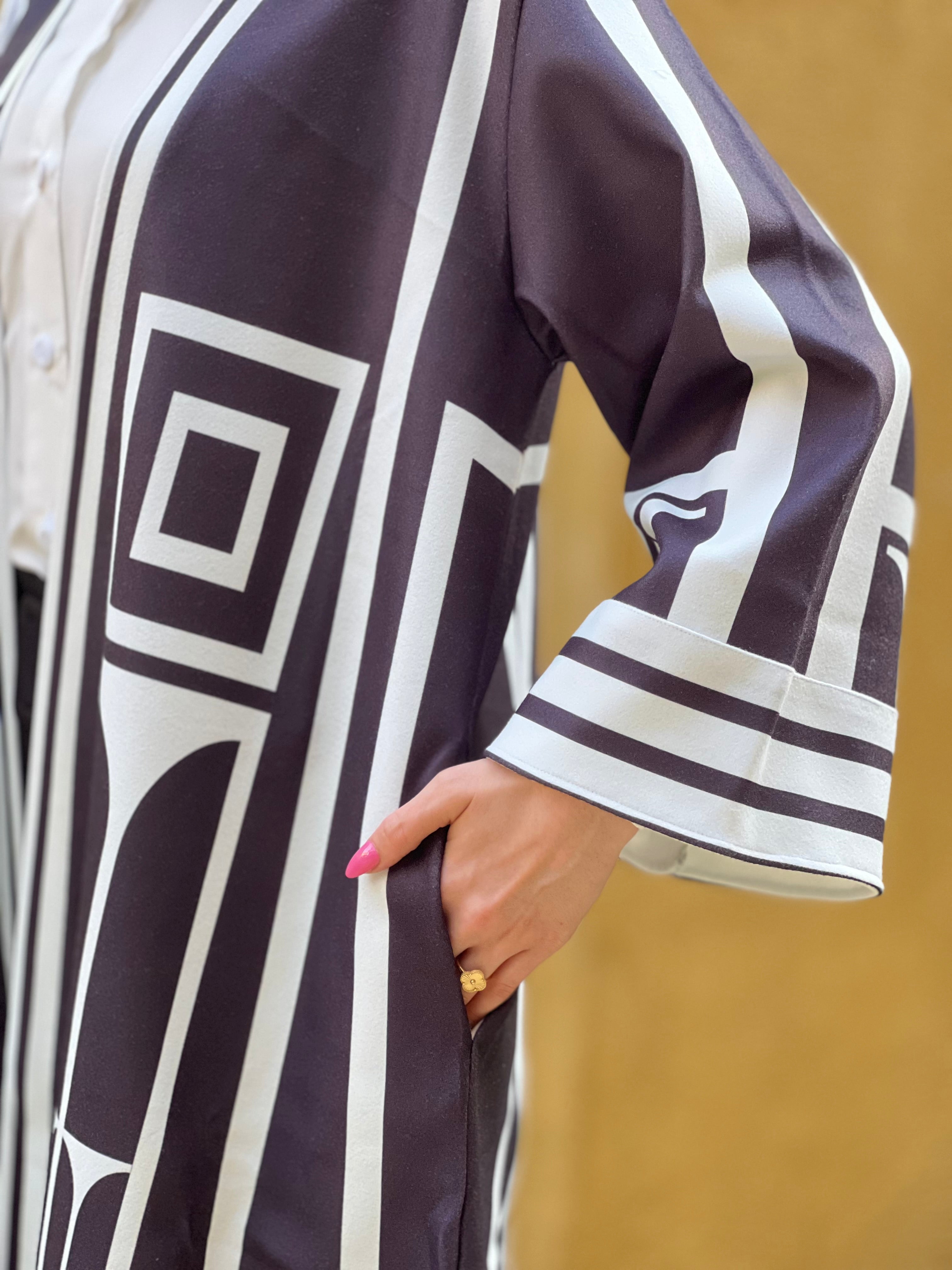 Valentino in Black Kaftan