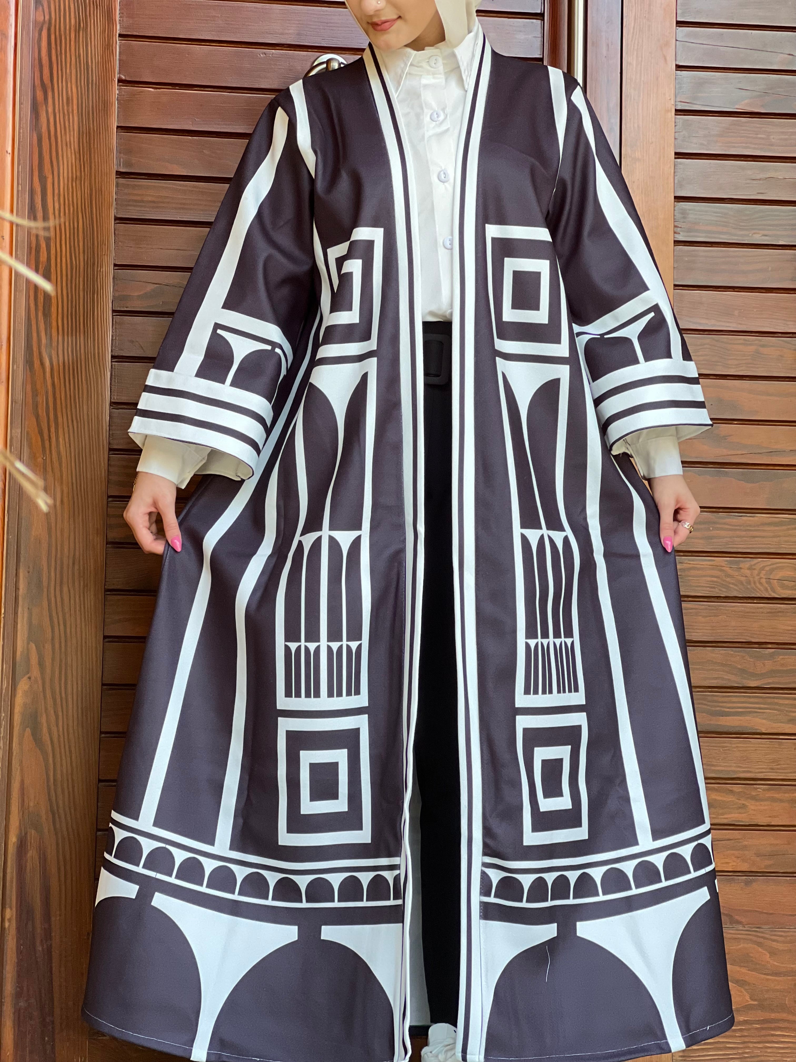 Valentino in Black Kaftan